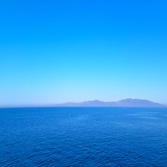 Image showing greece from the boat  islands in mediterranean sea and sky