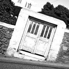 Image showing blue door in  village  greece europe and    white wall