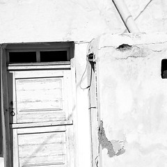 Image showing blue door in antique village santorini greece europe and    whit