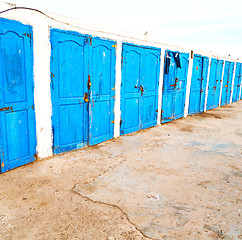 Image showing in africa morocco  old harbor wood   door and the blue sky