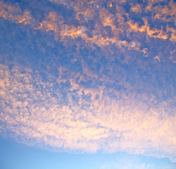 Image showing sunrise in the colored sky white soft clouds and abstract backgr