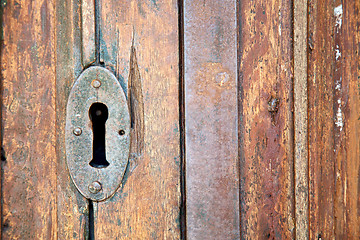 Image showing  door    in italy   ancian wood and traditional  texture nail