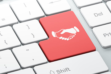 Image showing Finance concept: Handshake on computer keyboard background