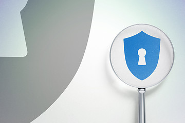 Image showing Privacy concept:  Shield With Keyhole with optical glass on digital background