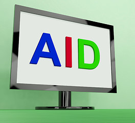 Image showing Aid On Monitor Shows Aiding Help Or Relief