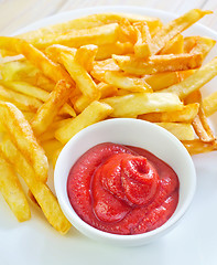 Image showing potato fries with sauce
