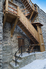 Image showing Wooden stairs the leader on a medieval city wall 