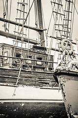 Image showing Old collapsing sailboats at the dock, close-up