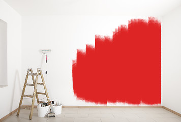 Image showing painting accessories red wall