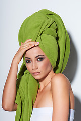 Image showing Woman with smokey makeup and green turban