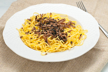 Image showing Pasta typical of Piedmont called tajarin with truffle