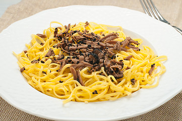 Image showing Pasta typical of Piedmont called tajarin with truffle