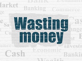 Image showing Banking concept: Wasting Money on wall background