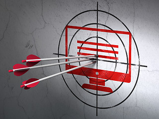 Image showing Web development concept: arrows in Monitor target on wall background