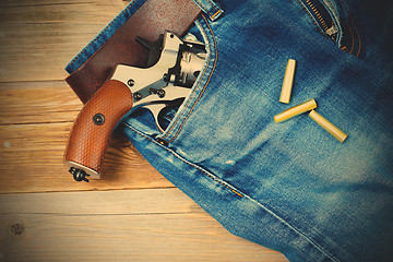 Image showing revolver in the pocket