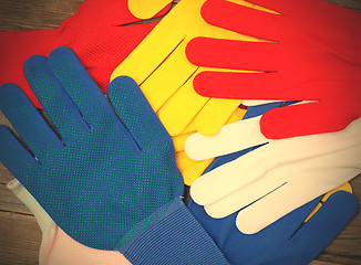 Image showing varicolored workers gloves