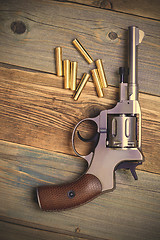 Image showing Vintage revolver nagant with seven cartridges