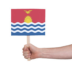 Image showing Hand holding small card - Flag of Kiribati