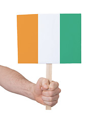 Image showing Hand holding small card - Flag of Ivory Coast