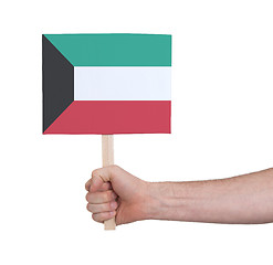 Image showing Hand holding small card - Flag of Kuwait