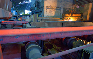 Image showing hot steel on conveyor