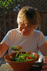 Image showing Eating senior woman