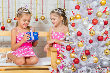 Image showing The girl gave another girl New Years gift