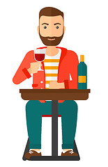 Image showing Man sitting at bar.