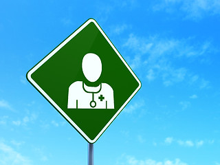 Image showing Health concept: Doctor on road sign background