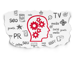 Image showing Marketing concept: Head With Gears on Torn Paper background