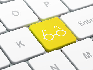 Image showing Science concept: Glasses on computer keyboard background