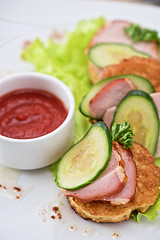 Image showing pancakes with ham and cucumber 