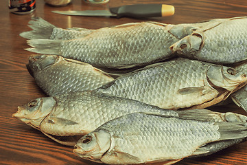 Image showing Salted and dried river fish on a white background.