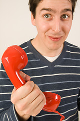 Image showing red telephone receiver