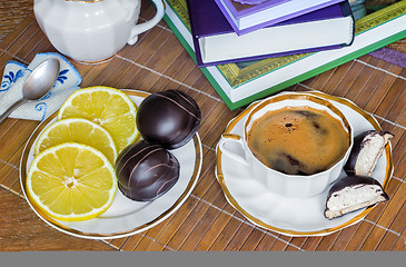 Image showing Still life : a Cup of black coffee on the table.