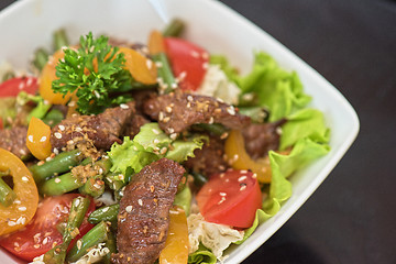 Image showing Warm salad with veal