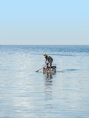 Image showing fisherman on the sea