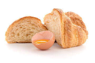 Image showing Croissant and raw egg