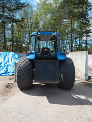 Image showing back of one big blue tractor