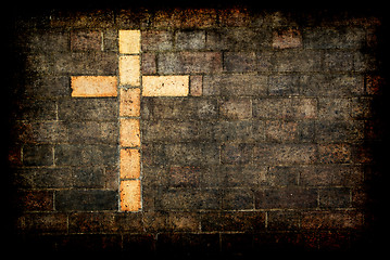 Image showing cross of christ built into a brick wall