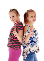 Image showing Two sisters showing thump up.