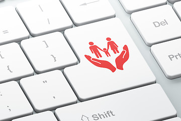 Image showing Insurance concept: Family And Palm on computer keyboard background