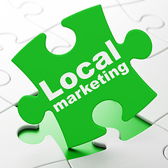 Image showing Advertising concept: Local Marketing on puzzle background