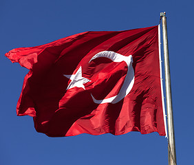 Image showing Turkish flag waving in wind at sunny day