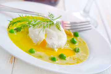 Image showing Fresh soup from green peas and egg-poached