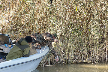 Image showing Fisherman with tackle 