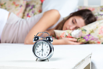 Image showing The young girl sleeping in bed