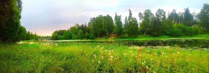 Image showing river with green banks in suburbs