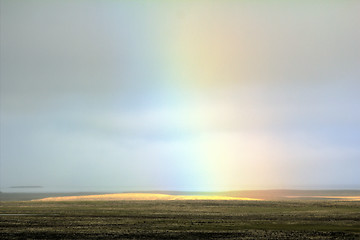 Image showing Pale mist rainbow in polar desert. Novaya Zemlya Archipelago. Russian Arctic