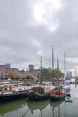 Image showing view at old boats on Rotterdam canal 